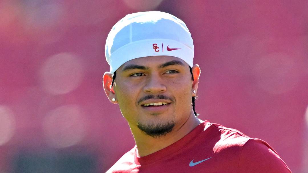 Oct 11, 2025; Los Angeles, California, USA;  USC Trojans quarterback Jayden Maiava (14) warms up prior to the game against the Michigan Wolverines at United Airlines Field at the Los Angeles Memorial Coliseum. Mandatory Credit: Jayne Kamin-Oncea-Imagn Images