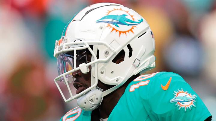 Dec 22, 2024; Miami Gardens, Florida, USA; Miami Dolphins wide receiver Tyreek Hill (10) runs with the football before the game against the San Francisco 49ers at Hard Rock Stadium. Mandatory Credit: Sam Navarro-Imagn Images