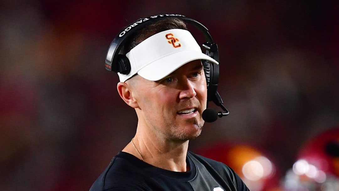 Sep 20, 2025; Los Angeles, California, USA; Southern California Trojans head coach Lincoln Riley speaks with the official during the second half at the Los Angeles Memorial Coliseum. Mandatory Credit: Gary A. Vasquez-Imagn Images
