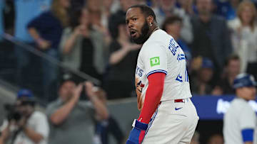 Oct 19, 2025; Toronto, Ontario, CAN; Toronto Blue Jays first baseman Vladimir Guerrero Jr. (27) celebrates after scoring in the seventh inning against the Seattle Mariners during game six of the ALCS round for the 2025 MLB playoffs at Rogers Centre. Mandatory Credit: Nick Turchiaro-Imagn Images
