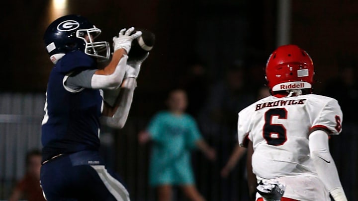 Greenwood's Grant Karnes (3) makes the catch as he's pursued by Northside's Josh Hardwick (6) during the Sept. 2 nonconference game at Smith-Robinson Stadium.

Gwd Northside 090222 014