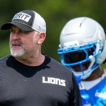Detroit Lions offensive coordinator John Morton watches practice during OTA 