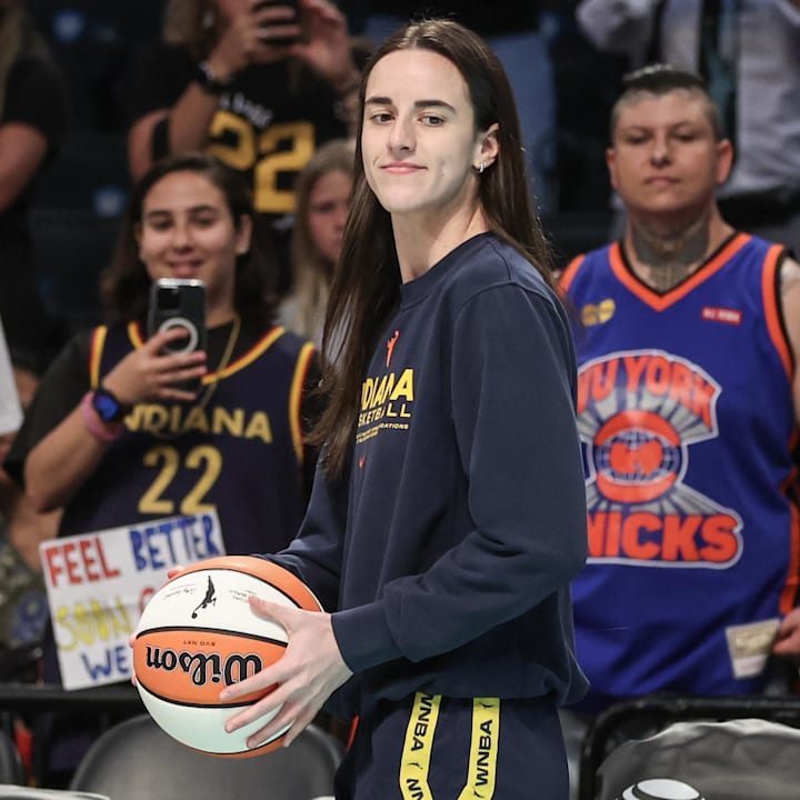 Indiana Fever guard Caitlin Clark walks onto the court prior to the game against the New York Liberty at Barclays Center.