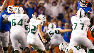 South Florida Bulls long snapper Andrew Beardall (48) bobbles the hold as South Florida Bulls place kicker Spencer Shrader (32) attempts to kick the game tying field goal in the second half against the Bulls at Steve Spurrier Field at Ben Hill Griffin Stadium in Gainesville, FL on Saturday, September 17, 2022. Florida won 31-28 [Doug Engle/Gainesville Sun]

Ncaa Football Florida Gators Vs Usf Bulls