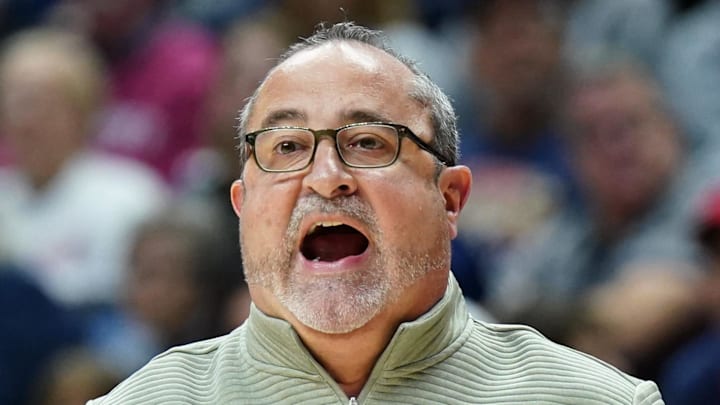 South Florida Bulls head coach Jose Fernandez watches from the sideline as they take on the UConn Huskies. South Florida Bulls head coach Jose Fernandez watches from the sideline as they take on the UConn Huskies.