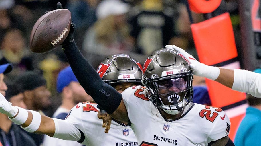 Tampa Bay Buccaneers safety Tykee Smith celebrates an interception of a ball intended for New Orleans Saints wide receiver Rashid Shaheed. | Matthew Hinton-Imagn Images
