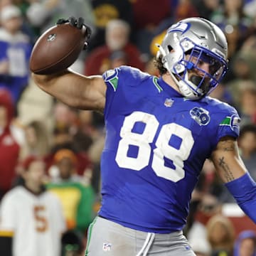 Nov 2, 2025; Landover, Maryland, USA; Seattle Seahawks tight end AJ Barner (88) celebrates scoring a touchdown against the Washington Commanders during the second half at Northwest Stadium.