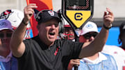 Oct 19, 2024; Berkeley, California, USA; North Carolina State Wolfpack head coach Dave Doeren (center) yells during the second quarter against the California Golden Bears at California Memorial Stadium. Mandatory Credit: Darren Yamashita-Imagn Images