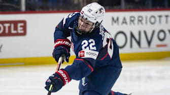 USA's Tessa Janecke shoots the puck at the Adirondack Bank Center in Utica, New York. 