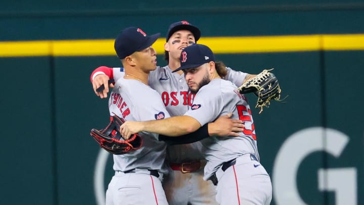 Aug 4, 2024; Arlington, Texas, USA; Boston Red Sox center fielder Jarren Duran (16) celebrates with Boston Red Sox left fielder Rob Refsnyder (30) and Boston Red Sox right fielder Wilyer Abreu (52) after the game against the Texas Rangers at Globe Life Field. Mandatory Credit: Kevin Jairaj-USA TODAY Sports