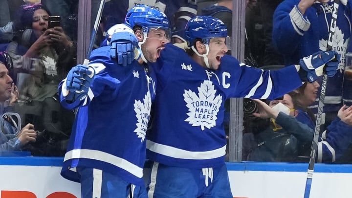 Mar 11, 2023; Toronto, Ontario, CAN; Toronto Maple Leafs center John Tavares (91) scores a goal and celebrates with Toronto Maple Leafs center Auston Matthews (34) against the Edmonton Oilers during the second period at Scotiabank Arena. Mandatory Credit: Nick Turchiaro-USA TODAY Sports