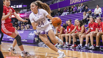 Washington guard Ellie Ladine drives with the basketball during a game at Hec Edmundson Pavilion in Seattle.