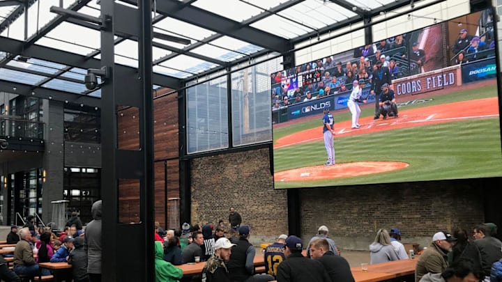 Brewers fans watch the playoff game Sunday afternoon at the Fiserv Forum's Oktoberfest. The game was broadcast on the MLB Channel which many fans did not get on their home TVs.

Brewers 1