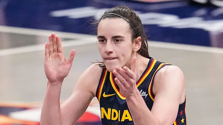 Indiana Fever guard Caitlin Clark claps her hands. Indiana Fever guard Caitlin Clark claps her hands.