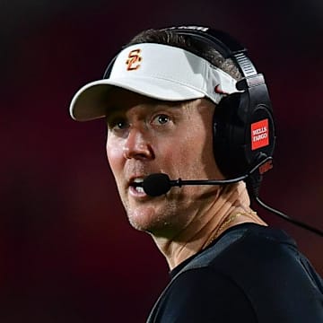 Sep 20, 2025; Los Angeles, California, USA; Southern California Trojans head coach Lincoln Riley watches game action against the Michigan State Spartans during the second half at the Los Angeles Memorial Coliseum. Mandatory Credit: Gary A. Vasquez-Imagn Images