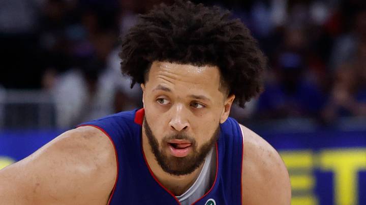 May 17, 2026; Detroit, Michigan, USA; Detroit Pistons guard Cade Cunningham (2) dribbles against Cleveland Cavaliers forward/center Dean Wade (32) in the second half during game seven of the second round of the 2026 NBA Playoffs at Little Caesars Arena. Mandatory Credit: Rick Osentoski-Imagn Images