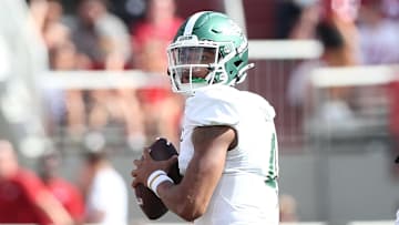 Sep 14, 2024; Fayetteville, Arkansas, USA; UAB Blazers quarterback Jacob Zeno (4) drops back to pass in the first quarter against the Arkansas Razorbacks at Donald W. Reynolds Razorback Stadium. Mandatory Credit: Nelson Chenault-Imagn Images