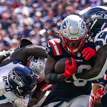 Sep 15, 2024; Foxborough, Massachusetts, USA; Seattle Seahawks linebacker Tyrice Knight makes a tackle in the second quarter at Gillette Stadium. Mandatory Credit: David Butler II-Imagn Images