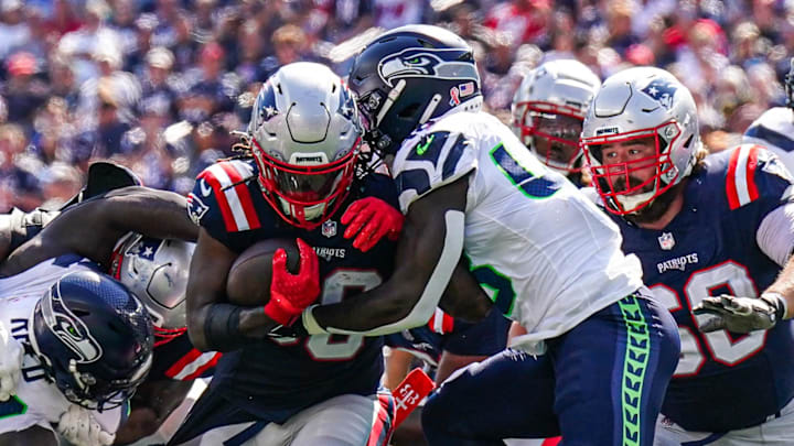 Sep 15, 2024; Foxborough, Massachusetts, USA; Seattle Seahawks linebacker Tyrice Knight makes a tackle in the second quarter at Gillette Stadium. Mandatory Credit: David Butler II-Imagn Images