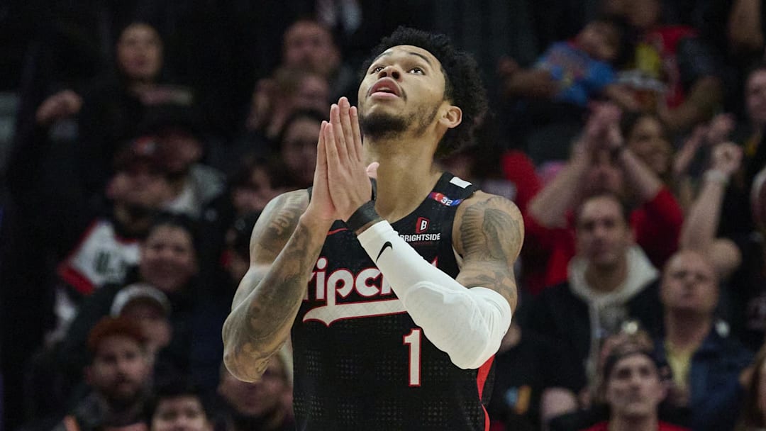 Jan 11, 2025; Portland, Oregon, USA; Portland Trail Blazers guard Anfernee Simons (1) reacts after being fouled and scoring a basket during the second half against the Miami Heat at Moda Center. Mandatory Credit: Troy Wayrynen-Imagn Images Jan 11, 2025; Portland, Oregon, USA; Portland Trail Blazers guard Anfernee Simons (1) reacts after being fouled and scoring a basket during the second half against the Miami Heat at Moda Center. Mandatory Credit: Troy Wayrynen-Imagn Images
