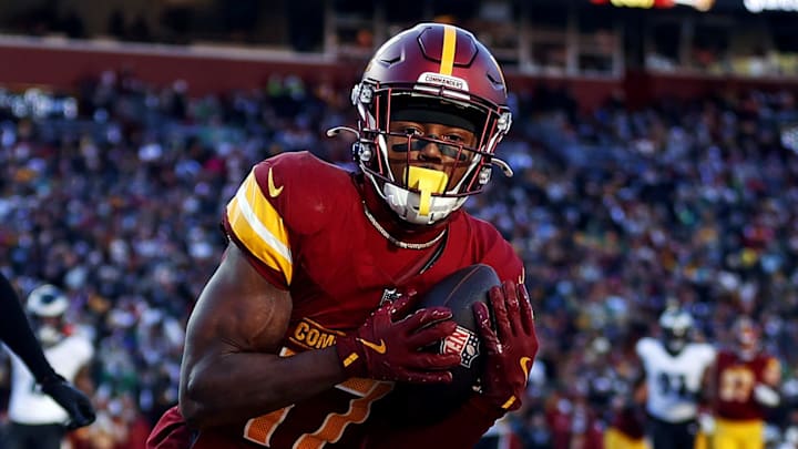 Washington Commanders wide receiver Terry McLaurin catches a touchdown pass.
