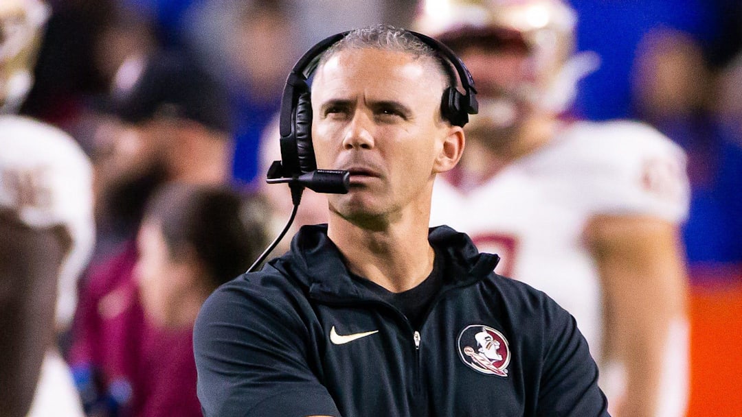 Florida State Seminoles head coach Mike Norvell looks to the replay screen at Steve Spurrier Field at Ben Hill Griffin Stadium in Gainesville, FL on Saturday, November 25, 2023 during the first half. [Doug Engle/Gainesville Sun]