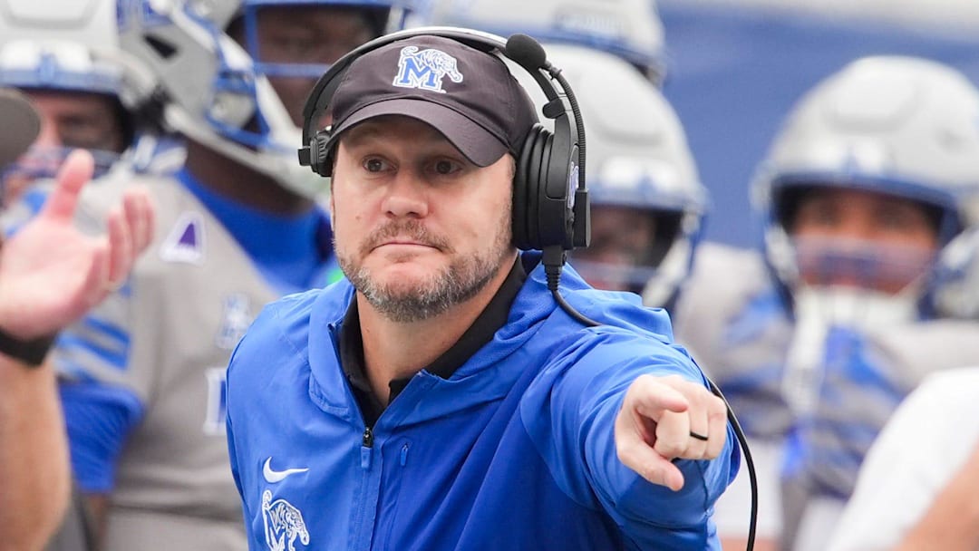 Memphis coach Ryan Silverfield points to a flag on the field after a penalty was called on USF during a game at Simmons Bank Liberty Stadium in Memphis, Tenn.