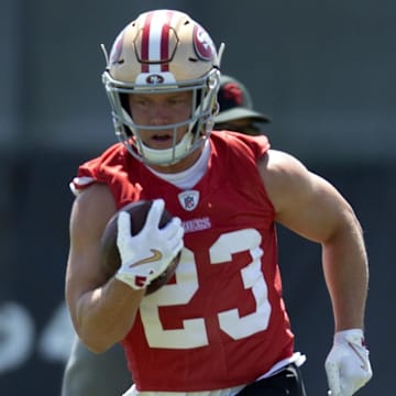 Jun 11, 2025; Santa Clara, CA, USA; San Francisco 49ers running back Christian McCaffrey (23) runs a play from scrimmage during a team OTA at Levi's Stadium. Mandatory Credit: D. Ross Cameron-Imagn Images