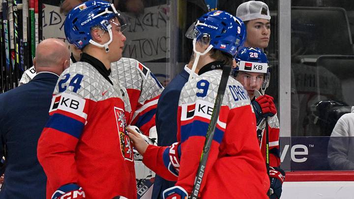 Jan 5, 2026; St. Paul, Minnesota, USA; Czechia defensemen Vladimir Dravecky (9) comforts forward Adam Novotny (24) as Czechia forward Stepan Hoch (25) looks on after falling to Sweden in the final of the 2026 IIHF World Junior Championship ice hockey tournament at Grand Casino Arena.