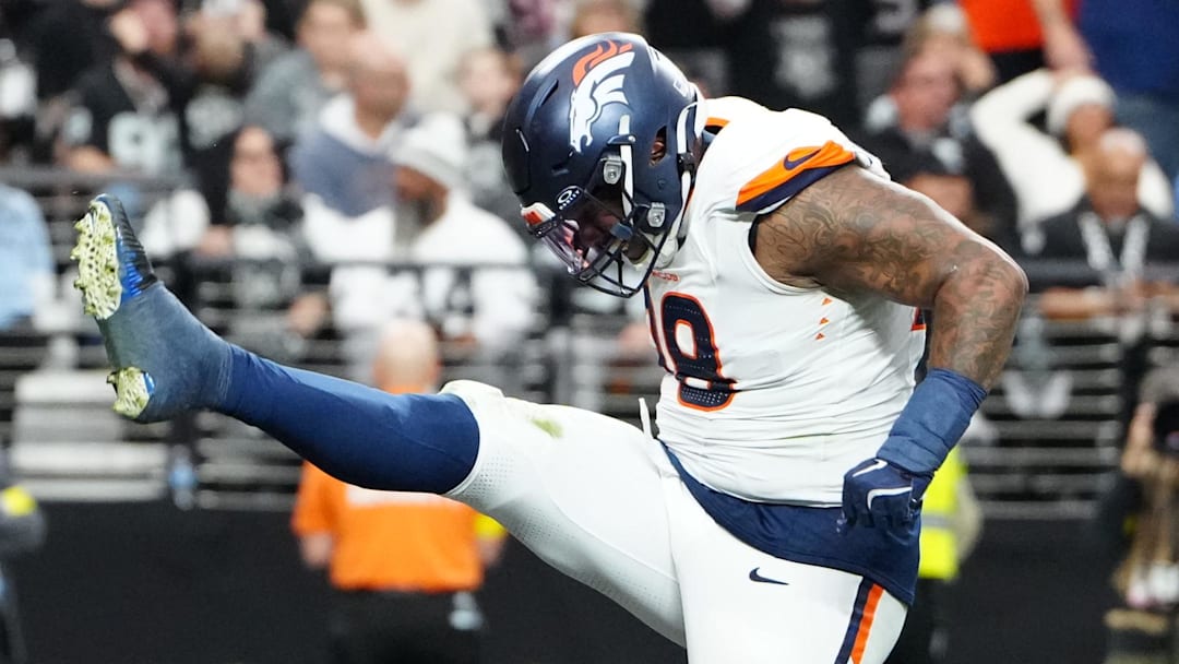 Dec 7, 2025; Paradise, Nevada, USA;  Denver Broncos defensive end John Franklin-Myers (98)  reacts after a sack against the Las Vegas Raiders during the first half at Allegiant Stadium. Mandatory Credit: Stephen R. Sylvanie-Imagn Images