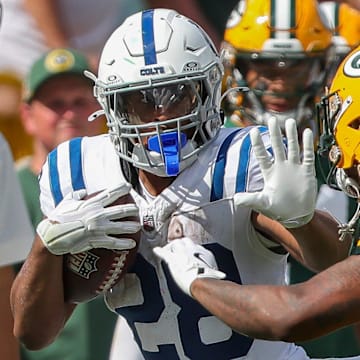 Indianapolis Colts running back Jonathan Taylor (28) stiff-arms Green Bay Packers safety Xavier McKinney (29) on Sunday, September 15, 2024, at Lambeau Field in Green Bay, Wis. The Packers won the game, 16-10.
Tork Mason/USA TODAY NETWORK-Wisconsin