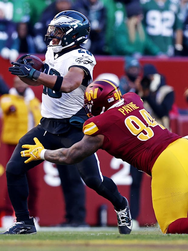 Philadelphia Eagles running back Saquon Barkley (26) and Washington Commanders defensive tackle Daron Payne (94) Philadelphia Eagles running back Saquon Barkley (26) and Washington Commanders defensive tackle Daron Payne (94)