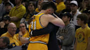 Mar 8, 2025; Columbia, Missouri USA; Missouri Tigers guard Caleb Grill (31) cries in the arms of head coach Dennis Gates during his final game at Mizzou Arena — a loss to the Kentucky Wildcats.