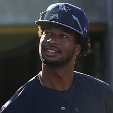 Hooks' Brice Matthews exits the tunnel onto the field before the game against the Amarillo Sod Poodles at Whataburger Field on Thursday, August 1, 2024, in Corpus Christi, Texas