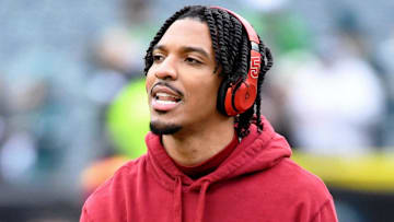 Jan 26, 2025; Philadelphia, PA, USA; Washington Commanders quarterback Jayden Daniels (5) looks on before the NFC Championship game at Lincoln Financial Field. Mandatory Credit: Eric Hartline-Imagn Images