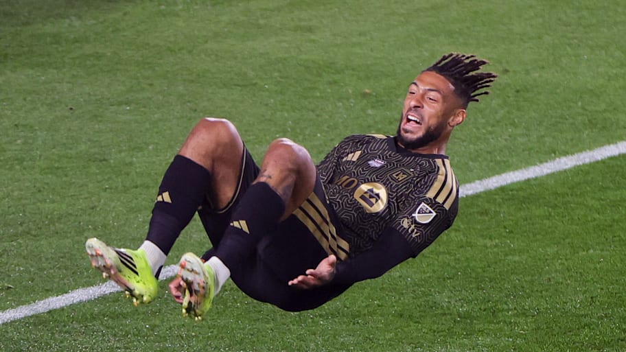 Denis Bouanga performing a somersault. 