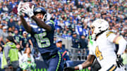 Sep 21, 2025; Seattle, Washington, USA; Seattle Seahawks wide receiver Tory Horton (15) catches the ball for a touchdown during the second quarter against the New Orleans Saints at Lumen Field.