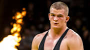 Iowa's Ben Kueter walks off the mat after winning his match by decision at 285 pounds during NCAA Big Ten Conference men's wrestling dual against Minnesota, Monday, Jan. 15, 2024, at Carver-Hawkeye Arena in Iowa City, Iowa.