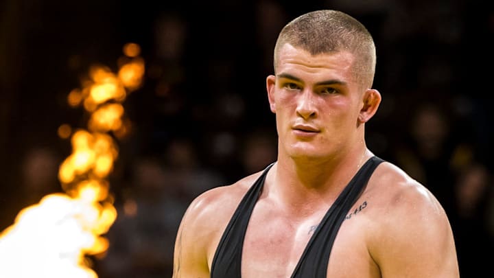 Iowa's Ben Kueter walks off the mat after winning his match by decision at 285 pounds during NCAA Big Ten Conference men's wrestling dual against Minnesota, Monday, Jan. 15, 2024, at Carver-Hawkeye Arena in Iowa City, Iowa.