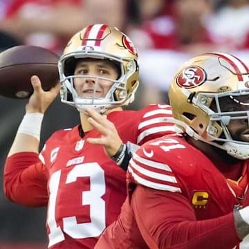 San Francisco 49ers offensive lineman Trent Williams blocks for quarterback Brock Purdy.