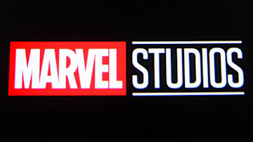 In this photo illustration a Marvel Studios logo is seen on...
