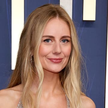Justine Lupe at the Emmys red carpet 2025.