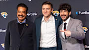The Jacksonville Jaguars introduced General Manager James Gladstone, center, during a press conference Monday morning February 24, 2025 at the Miller Electric Center in Jacksonville, Fla. He was joined by owner Shad Khan, left, Khan’s son, Director of Football Strategy Tony Khan, right. [Doug Engle/Florida Times-Union]2025