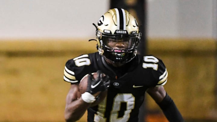 Greer's LaDainnian Martin (10) takes the ball down the field while playing against Hillcrest at Dooley Memorial Stadium in Greer, Friday, August 26, 2022.

Jg Greerhillcrest 082622 0016