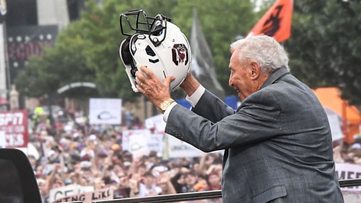 Lee Corso raises a South Carolina helmet before live broadcast during ESPN Gameday near Williams-Brice Stadium in Columbia, S.C.Saturday, September 14, 2024.