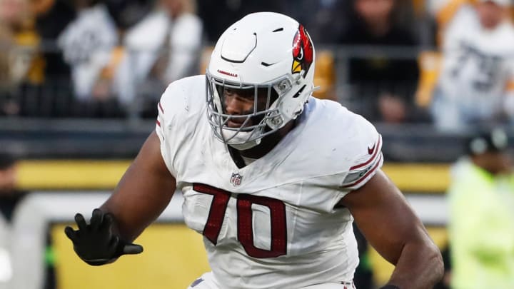 Dec 3, 2023; Pittsburgh, Pennsylvania, USA;  Arizona Cardinals offensive tackle Paris Johnson Jr. (70) blocks at the line of scrimmage against the Pittsburgh Steelers during the third quarter at Acrisure Stadium. Mandatory Credit: Charles LeClaire-USA TODAY Sports