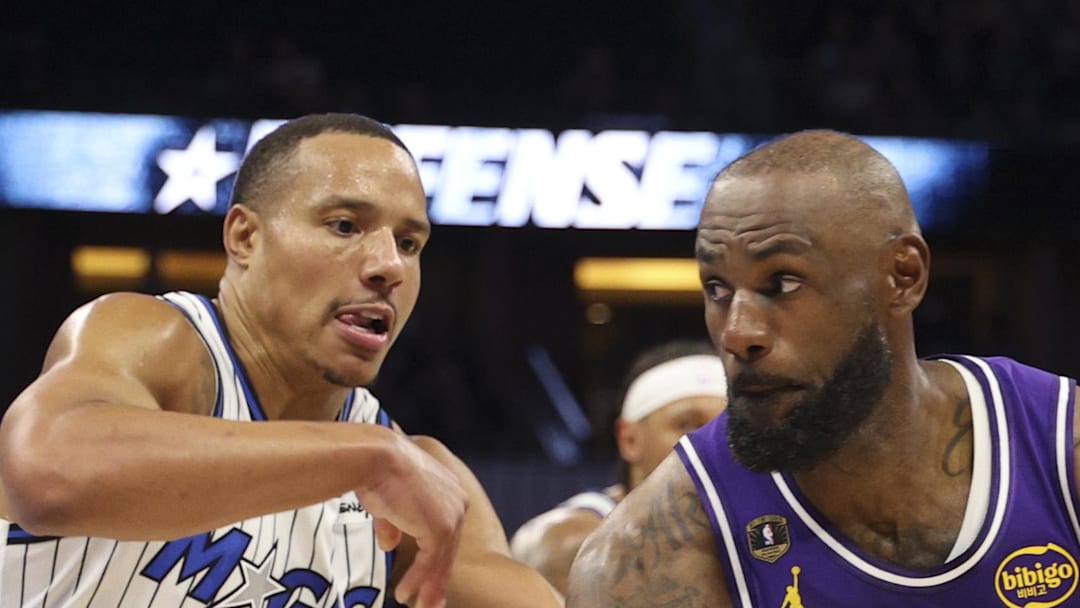 Los Angeles Lakers forward LeBron James drives to the basket past Orlando Magic guard Desmond Bane. Los Angeles Lakers forward LeBron James drives to the basket past Orlando Magic guard Desmond Bane.