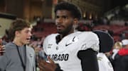 Nov 9, 2024; Lubbock, Texas, USA; Colorado Buffalos quarterback Shedeur Sanders (2) leaves the field after the game against the Texas Tech Red Raiders at Jones AT&T Stadium and Cody Campbell Field. Mandatory Credit: Michael C. Johnson-Imagn Images