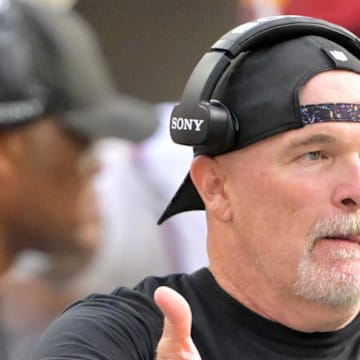Washington Commanders head coach Dan Quinn reacts in the second half against the Los Angeles Chargers.
