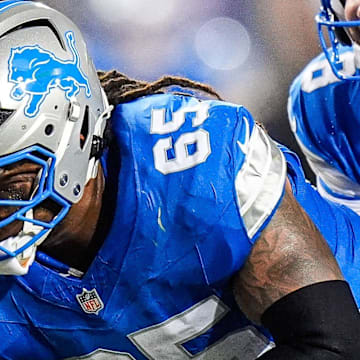 Detroit Lions center Kingsley Eguakun (65).